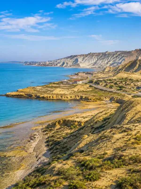 Absheron Peninsula in Azerbaijan with Ateshgah fire temple, rocky landscape, clear sky, and bright morning light.