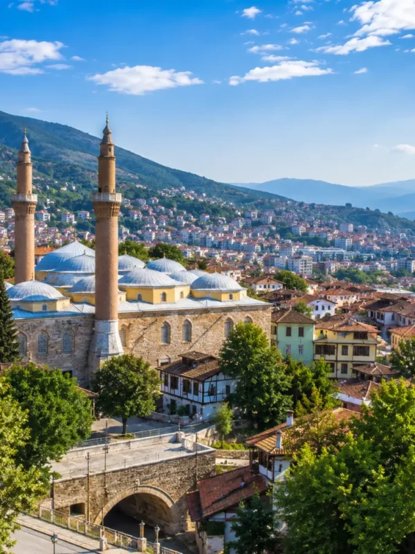 Bursa Turkey with Grand Mosque, green mountain scenery, Ottoman architecture, and bright morning atmosphere.