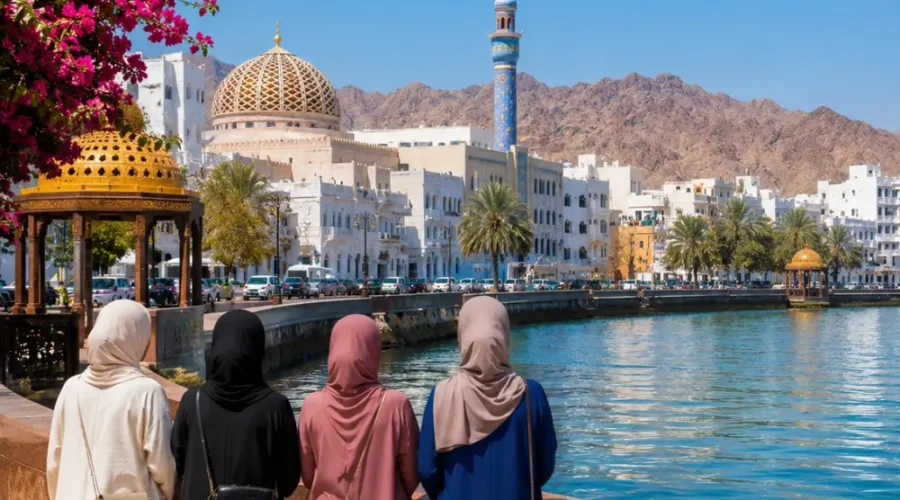 Women-only group enjoying the scenic Muscat Corniche with Sultan Qaboos Mosque and mountains in Oman