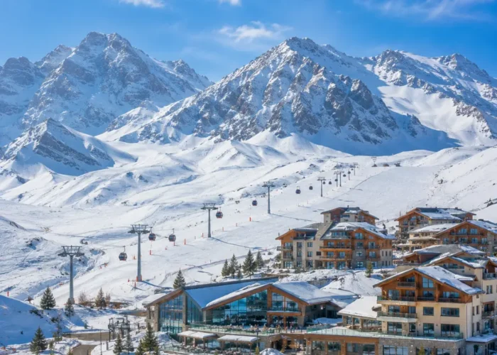 Shahdag Azerbaijan mountain resort with Caucasus peaks, green valley, luxury hotel, and bright morning atmosphere.