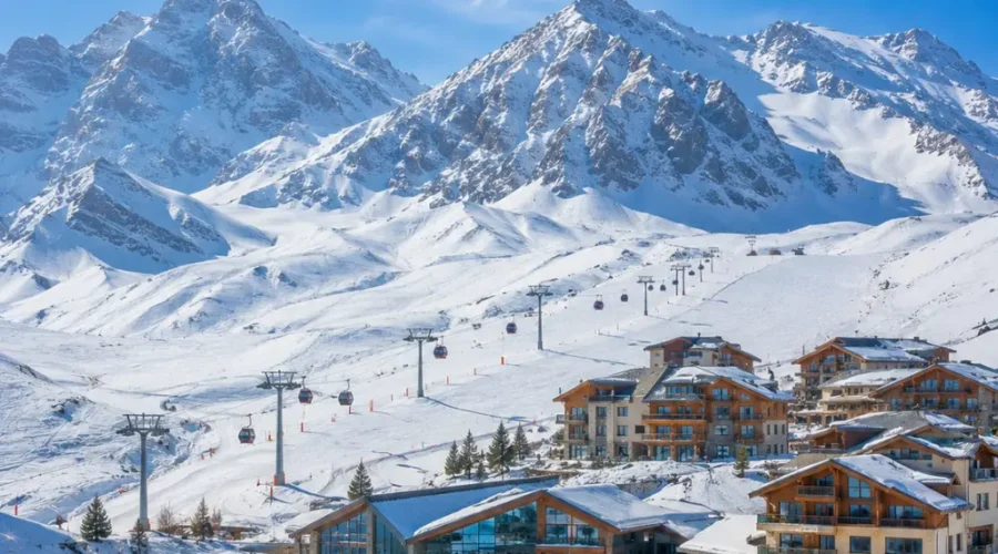 Shahdag Azerbaijan mountain resort with Caucasus peaks, green valley, luxury hotel, and bright morning atmosphere.