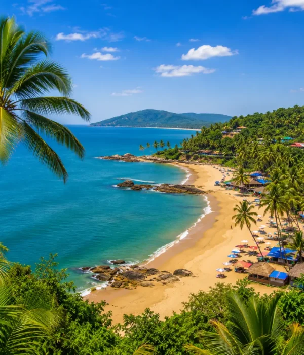 South Goa beach with soft golden sand, turquoise sea, coconut palms and peaceful clear morning coastal views.