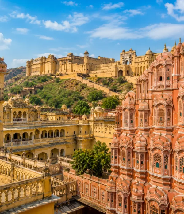 Jaipur city with Hawa Mahal, Amber Fort, royal pink architecture and clear morning daylight in Rajasthan.