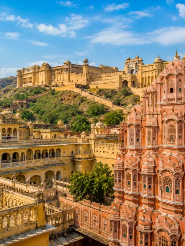 Jaipur city with Hawa Mahal, Amber Fort, royal pink architecture and clear morning daylight in Rajasthan.