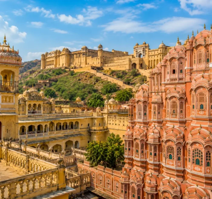 Jaipur city with Hawa Mahal, Amber Fort, royal pink architecture and clear morning daylight in Rajasthan.