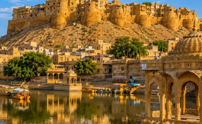 Jaisalmer fort with golden sandstone architecture, desert dunes and clear morning daylight in Rajasthan.